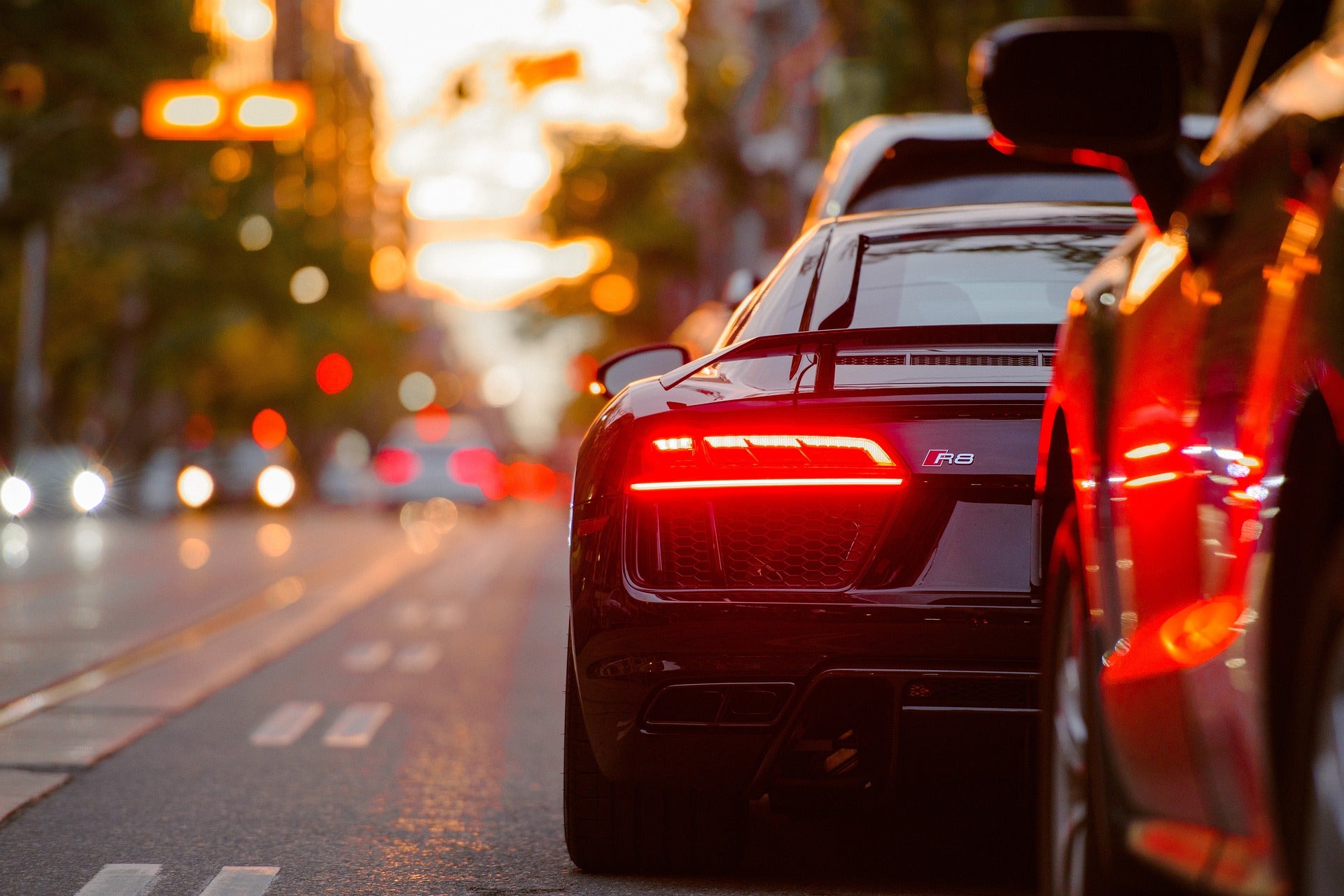 R8 waiting in traffic at sunset Stellar