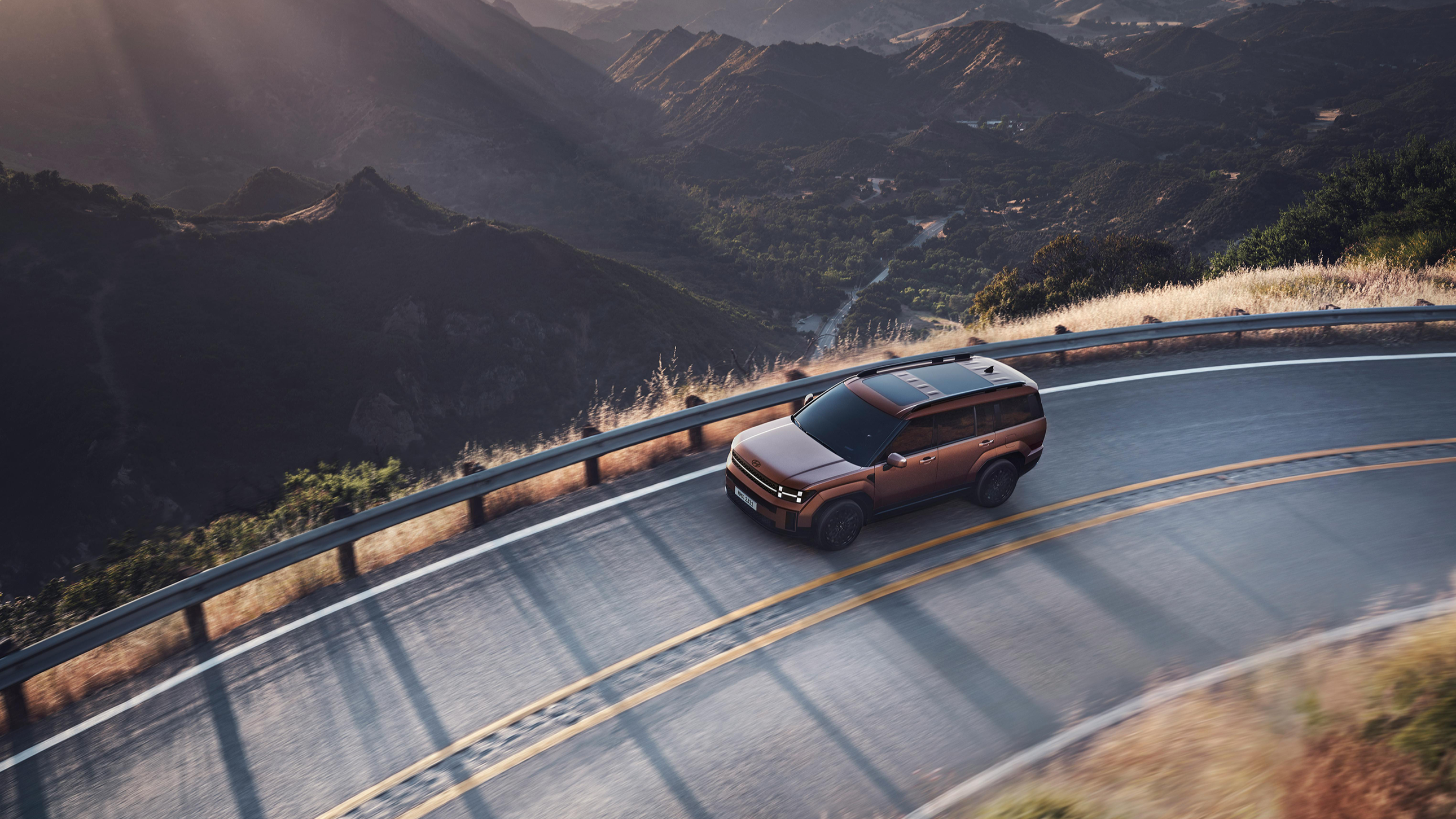 connected car driving on mountain road Stellar